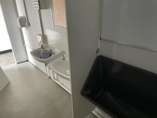 Urinal Inside a Modular Cabin 