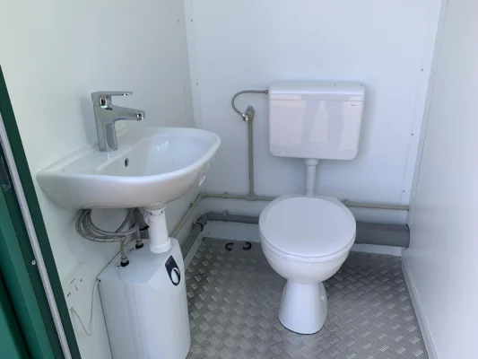 Sink and Toilet Inside a Modular Cabin